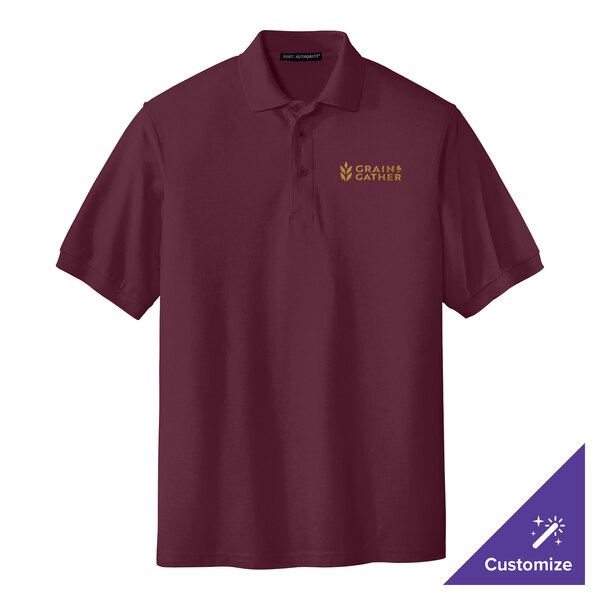 A medium burgundy Port Authority polo shirt with a logo on it.