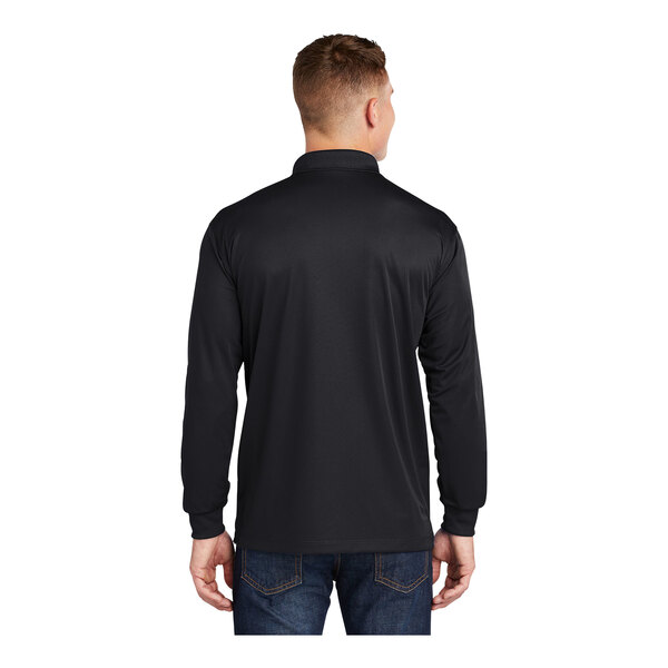 A man wearing a black Sport-Tek long sleeve polo shirt.