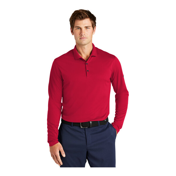 A man wearing a red Nike short sleeve polo.