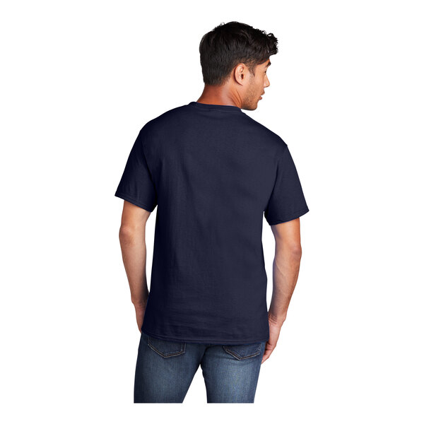A man wearing a Port & Company True Navy T-shirt.