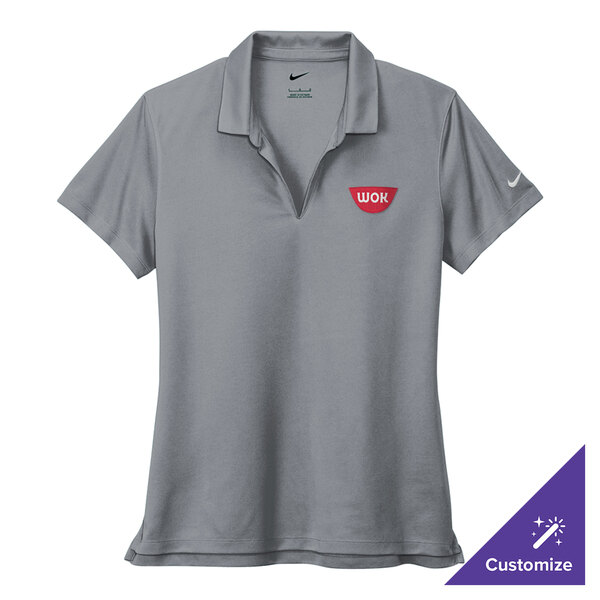 A Nike women's cool gray Dri-FIT polo shirt with a logo on it.