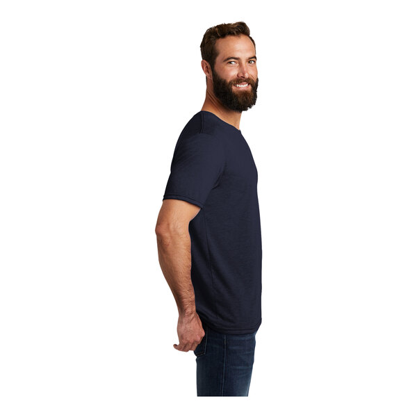 A man with a beard wearing a navy AllMade customizable T-shirt.