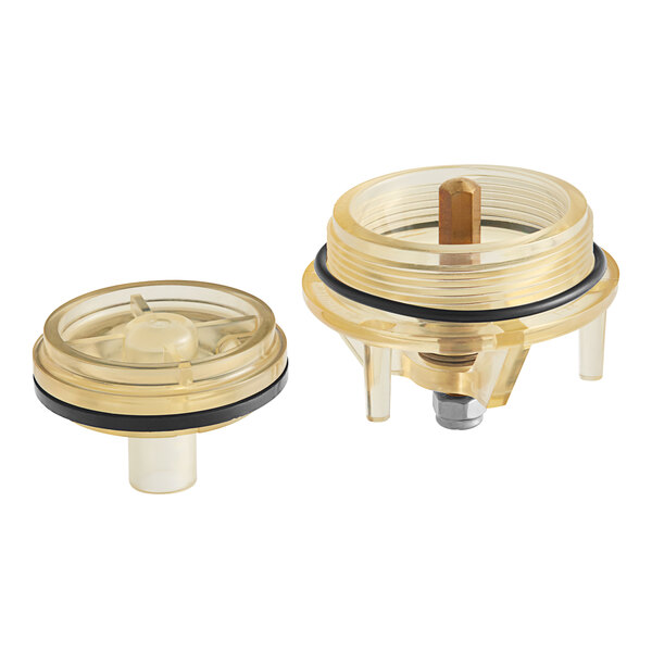 A close-up of a clear plastic Watts 905212 FRK-765-BP bonnet and poppet assembly with black and gold plastic parts.