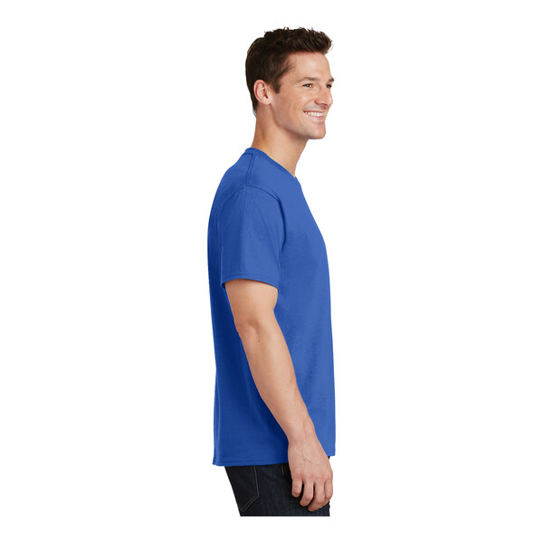 A man wearing a Port & Company royal blue short sleeve t-shirt.