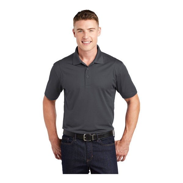 A man wearing an iron gray Sport-Tek short sleeve polo shirt.