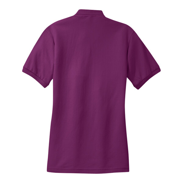A Port Authority women's deep berry polo shirt.