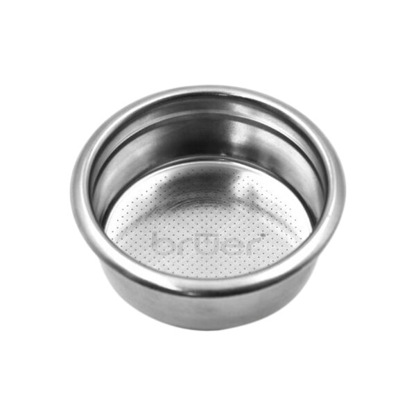 A close-up of a stainless steel espresso filter basket with ridges and holes.