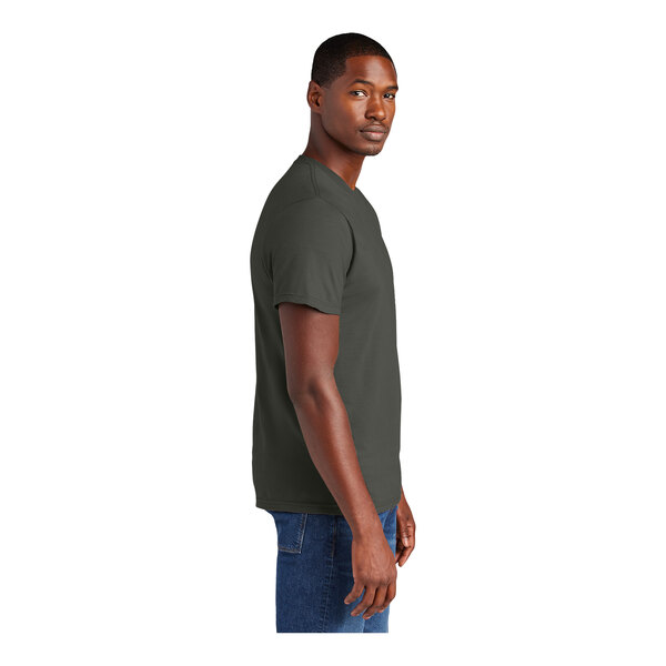 A person wearing a District Deepest Gray short sleeve T-shirt.