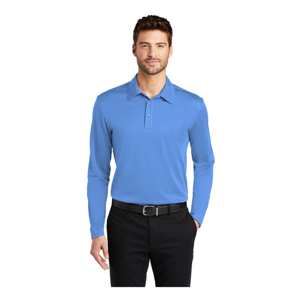 A man wearing a blue Port Authority long sleeve polo shirt.