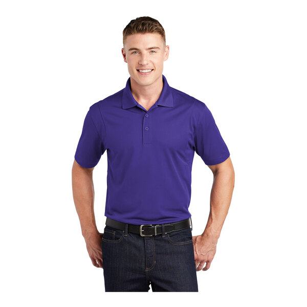 A man wearing a purple Sport-Tek short sleeve polo.