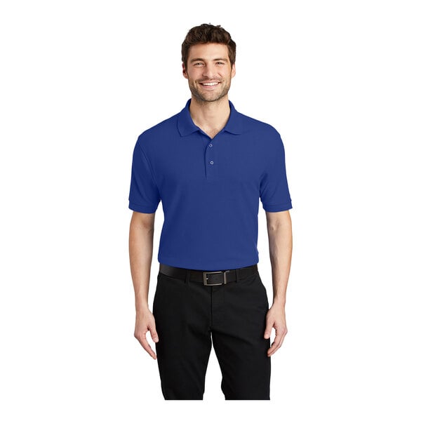 A man wearing a Port Authority® royal blue polo shirt.