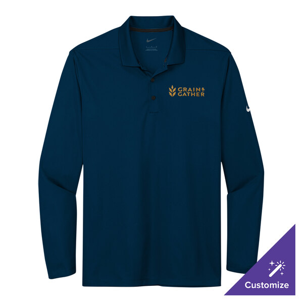 A small unisex navy Nike long sleeve polo shirt with a logo.