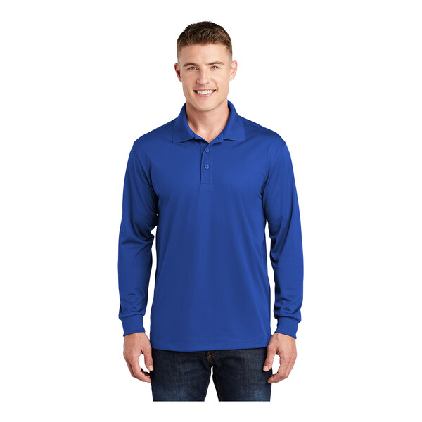 A man wearing a blue Sport-Tek long sleeve polo shirt.