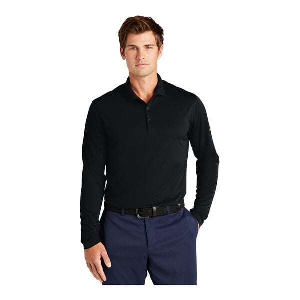 A man in a black Nike Dri-Fit short sleeve polo.