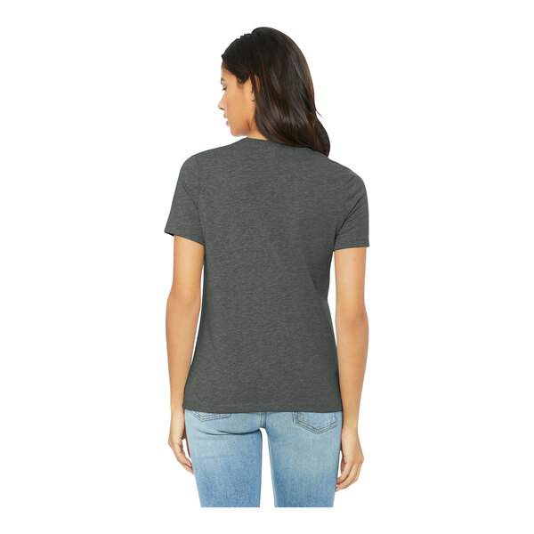 A woman wearing a Bella + Canvas deep heather grey customizable t-shirt.