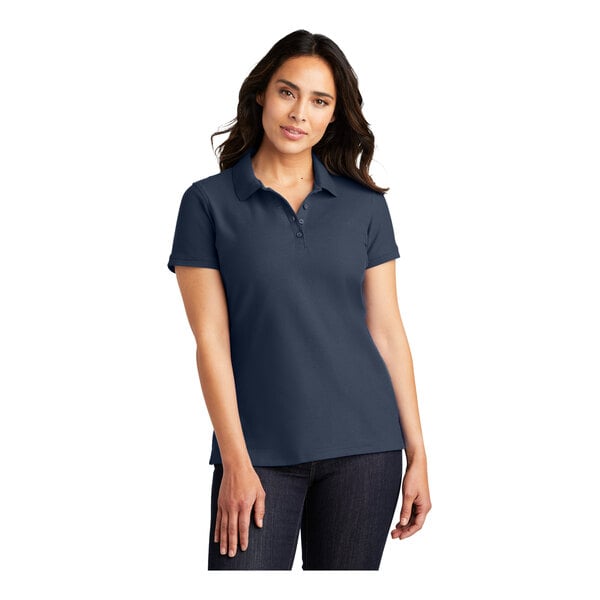 A woman wearing a River Blue Port Authority polo shirt.