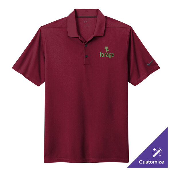 A Nike maroon polo shirt with a logo on it.