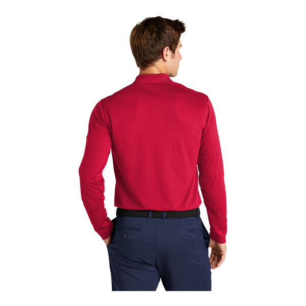 A man wearing a red Nike polo shirt.