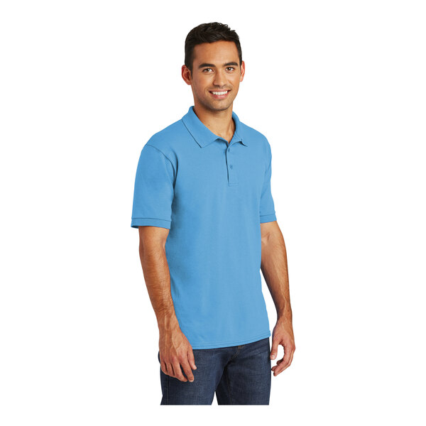 A man wearing an Aquatic Blue Port & Company short sleeve polo shirt.