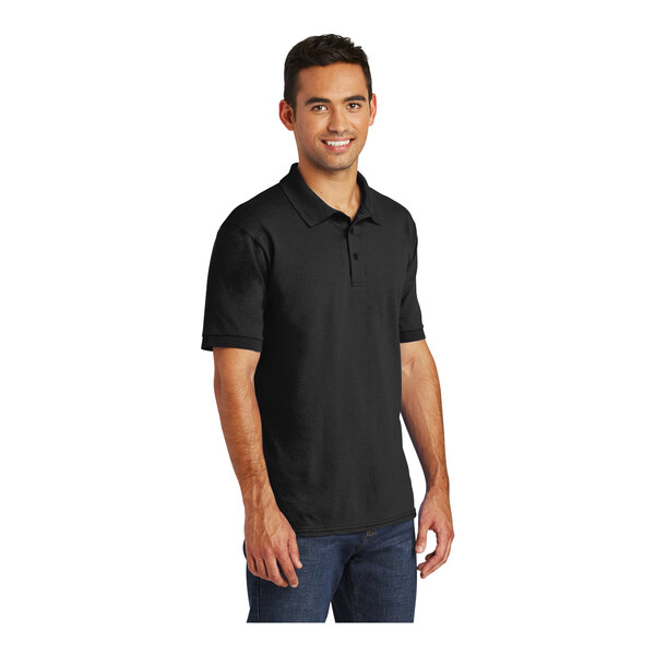 A man wearing a black Port & Company jersey knit polo shirt.