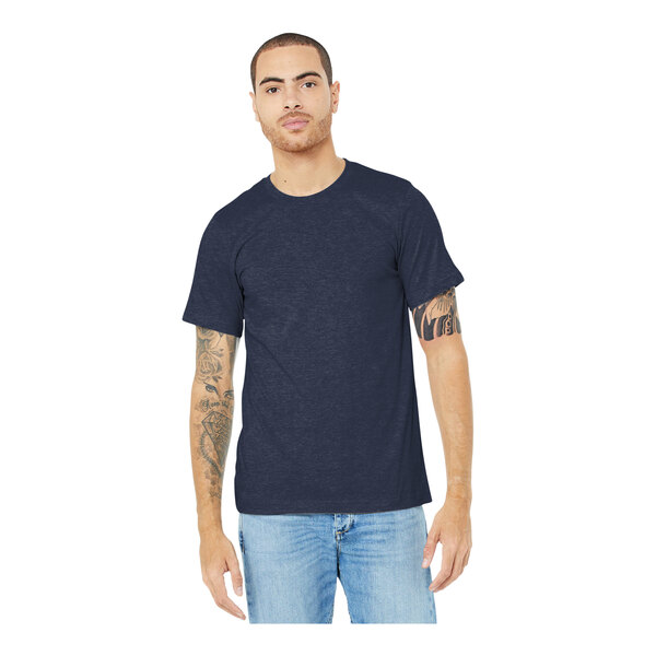 A man wearing a Bella + Canvas heather midnight navy t-shirt.