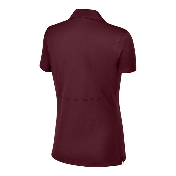 A maroon Sport-Tek women's short sleeve polo shirt.