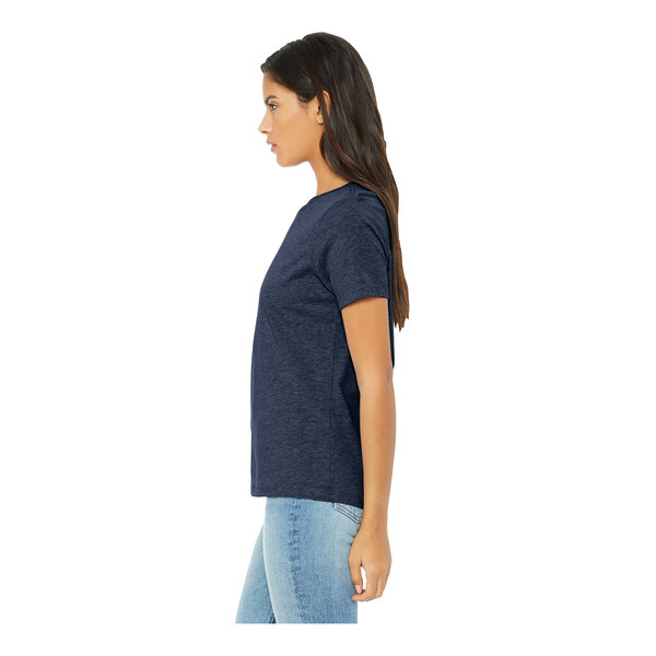 A woman wearing a Bella + Canvas heather navy short sleeve t-shirt.