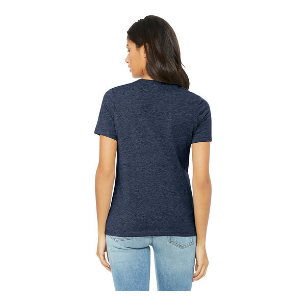 A woman wearing a Bella + Canvas heather navy short sleeve t-shirt.