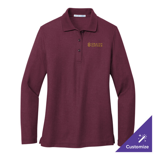 A medium women's Port Authority long sleeve burgundy polo shirt with gold embroidery.