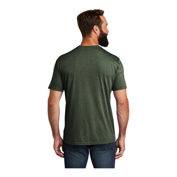 A man wearing a herb green AllMade short sleeve t-shirt.
