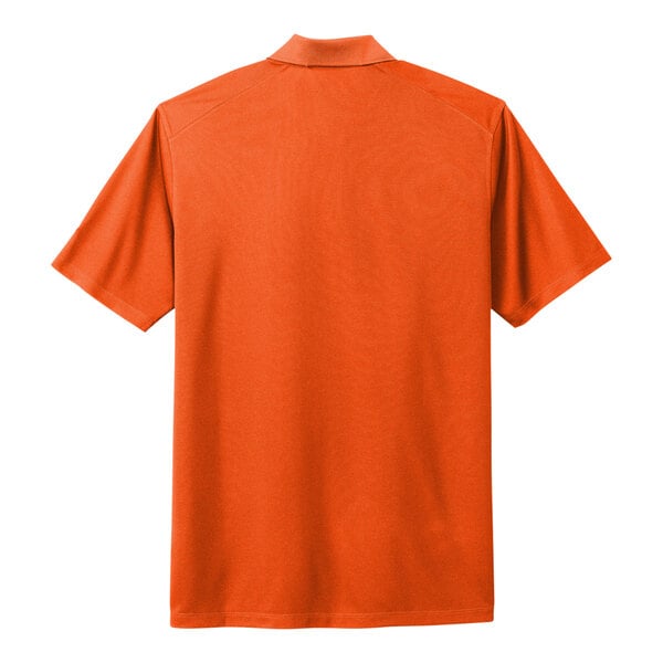 A Nike orange polo shirt with a white collar.