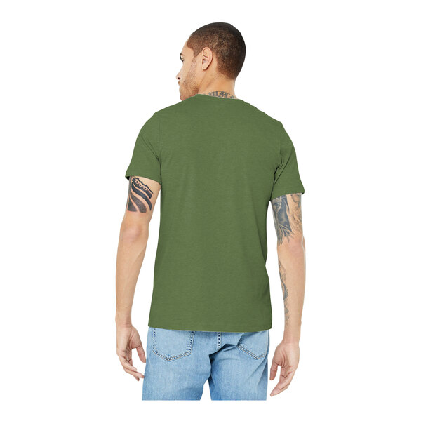 A man wearing a Bella + Canvas heather green customizable t-shirt.