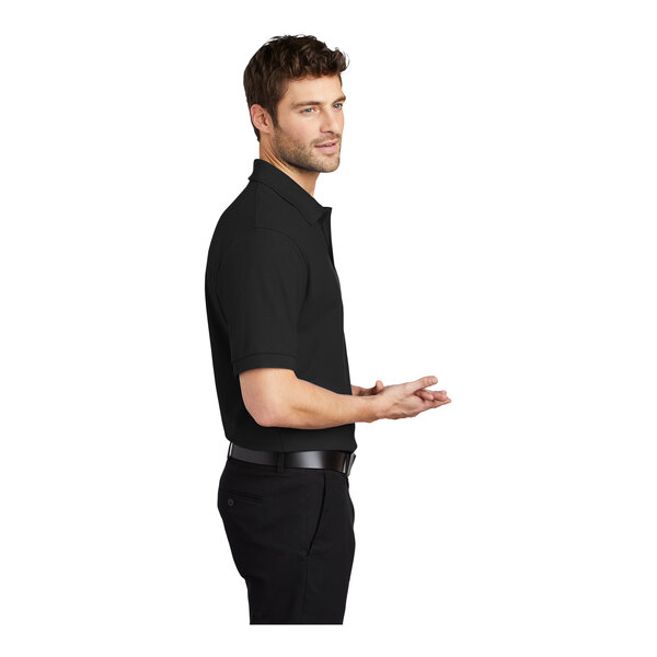 A man in a black Port Authority® silk touch polo shirt.