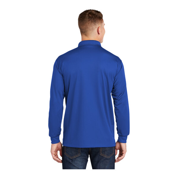 A man wearing a Sport-Tek royal blue long sleeve polo shirt.