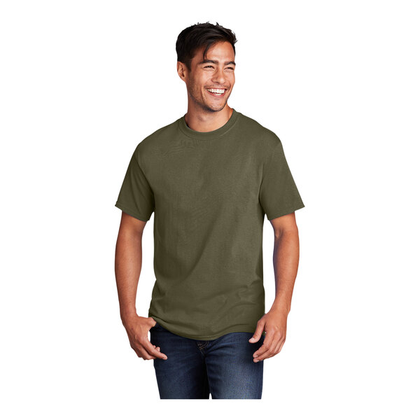 A man smiling and wearing an olive drab green Port & Company cotton t-shirt.
