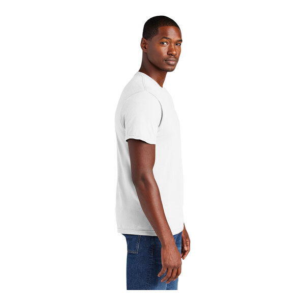 A man wearing a white District T-shirt.