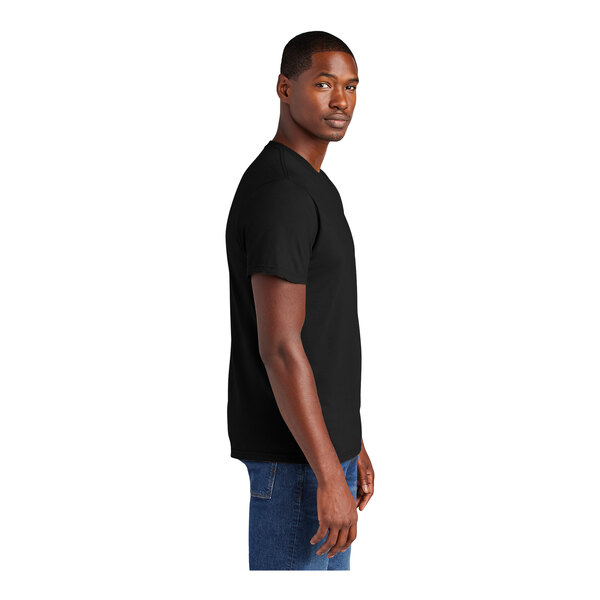 A man wearing a black District T-Shirt.