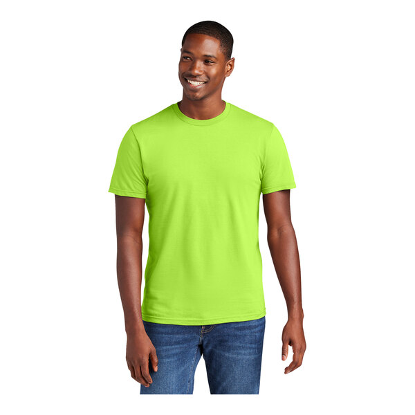 A man wearing a lime green District® T-shirt.