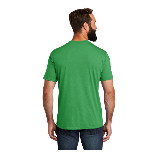 A man wearing a green AllMade short sleeve t-shirt.