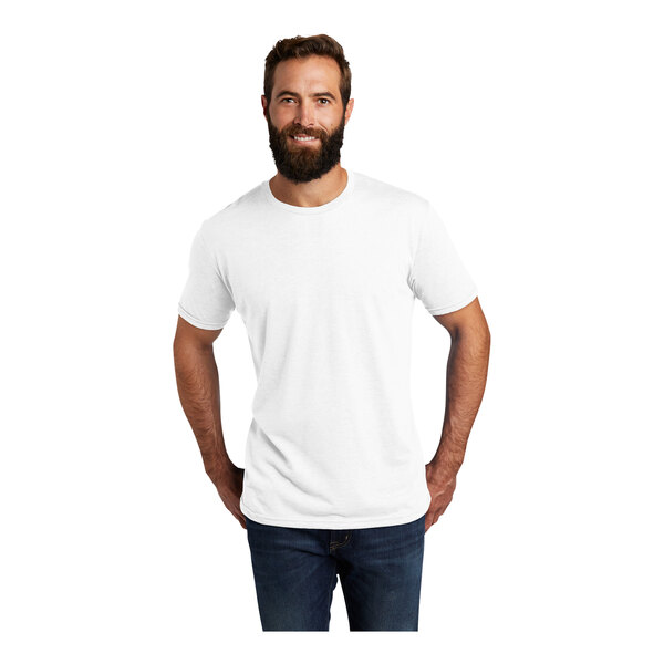 A man with a beard wearing a white AllMade short sleeve t-shirt.