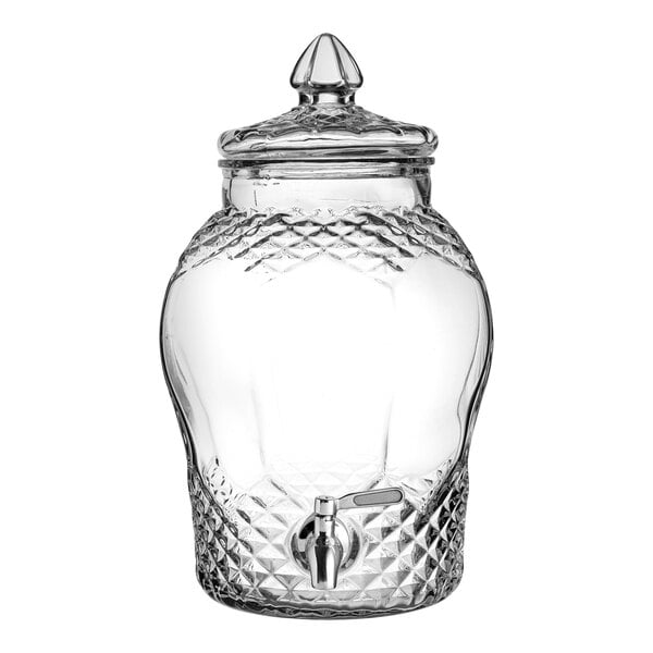 A clear glass barrel with a spigot for Utopia from Steelite International's Bon Bon Punch