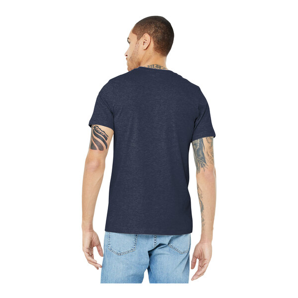 A man wearing a Bella + Canvas heather midnight navy t-shirt.