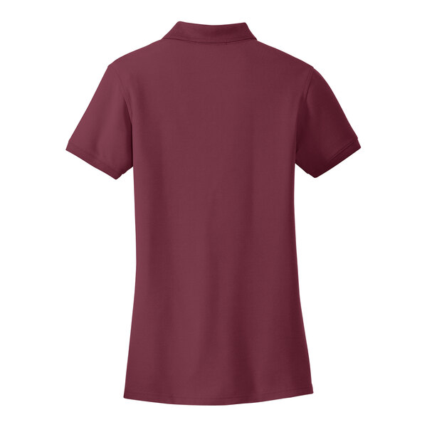 A Port Authority burgundy short sleeve polo shirt for women.