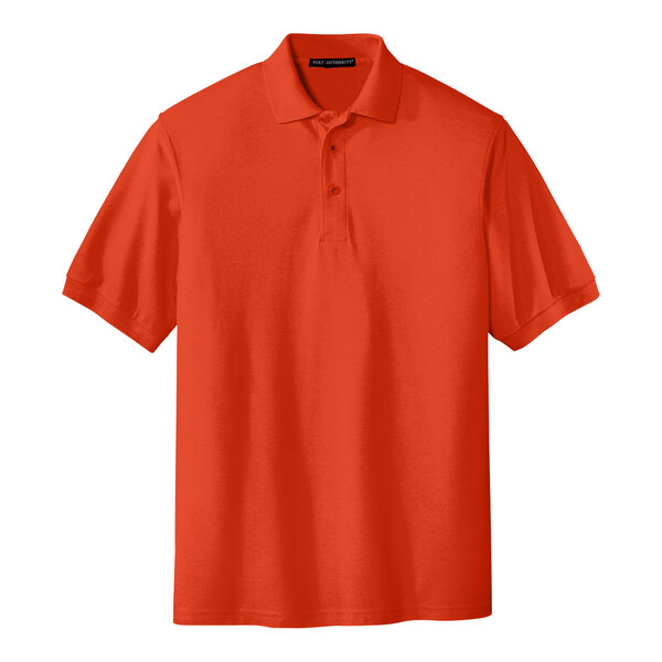 A Port Authority orange silk touch polo shirt.