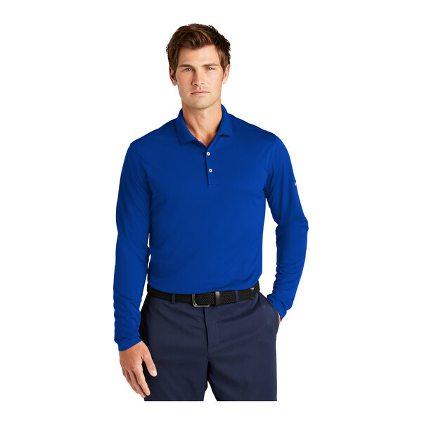 A man wearing a blue Nike short sleeve polo shirt.