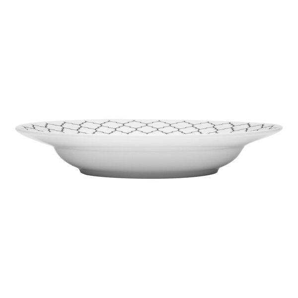 A white Libbey porcelain soup bowl with a black embossed pattern.