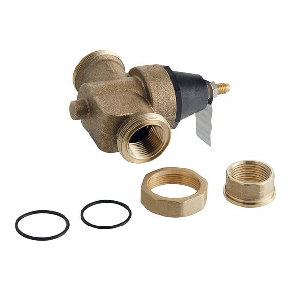 A close-up of a Watts brass water pressure reducing valve.