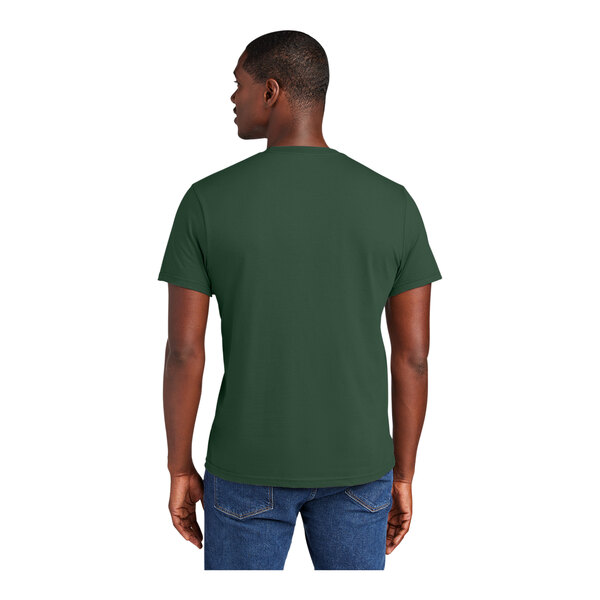 A man wearing a forest green District T-shirt.