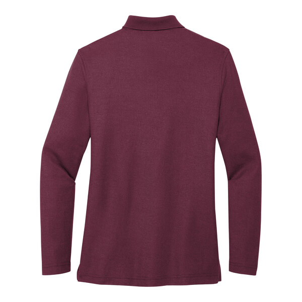 A Port Authority women's long sleeve silk touch pique polo shirt in burgundy.