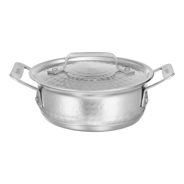 A Bon Chef stainless steel round dish with lid.